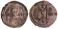 Byzantine Silver & Bronze Coins Justinian I, (A.D. 527-565), AE follis, Constantinople Mint (22.97 g), issued year 13, obv. facing bust, around DN IVSTINIANVS PP AVG, rev. Large M, ANNO to left, cross