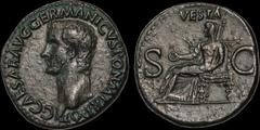 Roman Imperial Gaius (Caligula). A.D. 37-41. Æ as. 10.85 gm. 27 mm. Rome mint. Struck A.D. 37-38. His bare head left; C CAESAR AVG GERMANICVS PON M TR POT / Vesta seated left on ornamental throne, hol