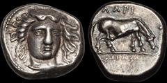 Greek THESSALY. Larissa. Circa 400-370 B.C. AR drachm. 6.23 gm. 17 mm. Reverse die signed by Simo-. Head of the nymph Larissa facing slightly right / Horse grazing right; thyrsos(?) to right; ΛΑΡI abo