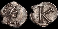BYZANTINE EMPIRE. Anonymous. Time of Justinian I, circa 527-565. AR half siliqua. .88 gm. 13 mm. Constantinople mint. Struck circa 530. Helmeted and draped bust of Constantinopolis right / Large K. Be