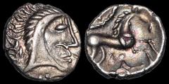 CELTIC BRITAIN. Iceni. Queen Boudicca. 61 A.D. AR unit. 1.23 gm. 13 mm. Uninscribed, moustache (face/horse) type. Stylized head right / Horse right, lozenge with pellets and concave sides below, pelta