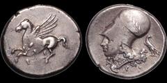 Greek CORINTHIA. Corinth. Fifth period, 345-307 B.C. AR stater. 8.59 gm. 22 mm. Pegasus flying left, koppa below / Head of Athena left wearing Corinthian helmet with wreath; A - P; to right, eagle sta