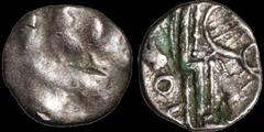 Celtic Britain CELTIC BRITAIN. South Western Region, Durotriges. 1st Century B.C. AR unit. .49 gm. 12 mm. Vestiges of the "three men in a boat" design / A geometric design, a "zigzag" line with dotted