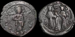 Byzantine BYZANTINE EMPIRE. Constantine X. 1059-1067. Æ follis. 7.27 gm. 28 mm. Christ standing facing on footstool, holding book of Gospels / Eudocia on left and Constantine on right standing facing,