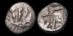 Celtic Britain CELTIC BRITAIN. South Western Region. Durotriges. Circa 58 B.C. - A.D. 43. AR quarter stater. 1.12 gm. 11 mm. Stylized boat with three standing figures aboard, pellet rosette to left / 