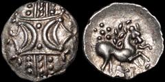 Celtic Britain CELTIC BRITAIN. East Anglian Region. Ecen. A.D. 10-43. AR unit. 1.18 gm. 13 mm. Double crescent emblem / Stylized horse right with a more realistic depiction of the horse's head than ty