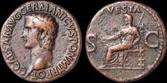 Roman Imperial Gaius (Caligula). A.D. 37-41. Æ as. 9.57 gm. 27 mm. Rome mint. Struck A.D. 37-38. His bare head left; C CAESAR AVG GERMANICVS PON M TR POT / Vesta, veiled and draped, seated left on orn