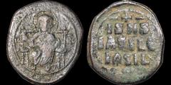Byzantine BYZANTINE EMPIRE. Temp. Constantine IX. 1042-1055. Æ follis (anonymous). 14.54 gm. 30 mm. Class D. Constantinople mint. Christ enthroned facing, holding book of Gospels / -+- | IS XS | BASIL