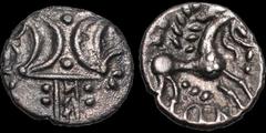 Celtic Britain CELTIC BRITAIN. East Anglian Region, Iceni. Ecen. Circa A.D. 10-43?. AR unit. .77 gm. 14 mm. Double crescent symbol over a vertical wreath / Horse right with a pellet eye, S below head;