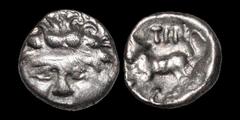 Celtic Britain CELTIC BRITAIN. Southern: Regini and Atrebates. Tincomarus. Circa 25 B.C - A.D. 10. AR unit. 1.19 gm. 10 mm. A large facing head (Medusa?) / A bull leaping left, head facing; TIN above,