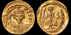 Byzantine BYZANTINE EMPIRE. Phocas. 602-610. AV solidus. 4.45 gm. 20 mm. Constantinople mint, 7th officina. His crowned, draped, and cuirassed bust facing, holding globus cruciger / Angel standing fac