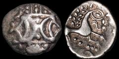 Celtic Britain CELTIC BRITAIN. East Anglian Region. Iceni. Ecen (?). A.D. 10-43. AR unit. 1.14 gm. 13 mm. Double crescent symbol over a vertical wreath / Horse prancing right with a pellet eye, revers