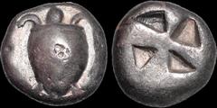 Greek ISLANDS OFF ATTICA. Aegina. Circa 525-475 B.C. AR stater. 11.91 gm. 18 mm. Sea turtle with collar; multiple countermarks at same position on shell (uncertain designs) / Incuse square with mill-s