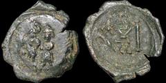 Byzantine BYZANTINE EMPIRE. Constans II, with Constantine IV. 641-668. Æ follis. 4.48 gm. 27 mm. Syracuse mint. Struck 654-659. Constans and Constantine standing facing / Large M; monogram above, SCL 