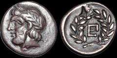 PELOPONNESOS. ARGOLIS. Epidauros. Circa late 280-260 B.C. AR hemidrachm. 2.64 gm. 15 mm. Laureate head of Asklepios left / EP monogram within wreath. SNG Copenhagen 116. BCD Peloponnesos 1232-1233 (sa