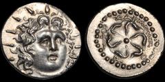 Greek ISLANDS OFF CARIA. Rhodos. Rhodes. Circa 88/42 B.C.-A.D. 14. AR drachm. 4.19 gm. 20 mm. Charmios, magistrate. Radiate head of Helios facing slightly right / Rose seen from above; XAPMEIOΣ above,