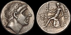 Greek SELEUKID EMPIRE. Antiochos II Theos. 261-246 B.C. AR tetradrachm. 17.04 gm. 27 mm. Seleukeia on the Tigris mint. Diademed head of Antiochos I right / Apollo Delphios seated left on omphalos, hol