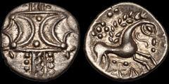Celtic Britain CELTIC BRITAIN. Iceni. Inscribed (Ecen). Circa A.D. 10-43(?). AR unit. 1.22 gm. 15 mm. Two crescents on vertical wreath / Celticized horse stepping right, head facing, pelleted sun abov