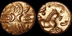 Celtic Britain CELTIC BRITAIN. Catuvellauni. Tasciovanus. Circa 25 B.C.-A.D. 10. AV quarter stater. 1.35 gm. 10 mm. Cruciform wreaths extending from back to back crescents; T Λ S C in angles around / 