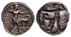 Magna Graecia Bruttium. Kaulonia. AR Stater, ca. 475-470 BC.8.15 gms. KAΛV (the A inverted), Nude Apollo advancing right, holding laurel branch in his upright right hand, small daimon running right 