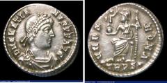 Ancient Coins Gratian. Ar siliqua. C, 375-378 AD. Rev; VRBS ROMA; Roma seated facing on throne, head l., holding globe and spear; TRPS•.in ex. RIC 46b. Good metal no flan cracks. 2.11g. VF