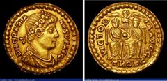 Ancient Coins Gratian. Au solidus. C, 374-375 AD. Trier. Ev; VICTORIA AVGG; two emperors seated facing, jointly holding globe; Victory above, wings spread; palm branch below; TROBC in ex. RIC 39c. Sca