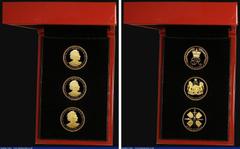 World Cased St. Helena 2018 The Queen Elizabeth II Sapphire Jubilee Collection a 3-coin set in gold comprising Guineas (3) 2018 Reverse: Crowned ER monogram, 2018 Reverse: Four shields in cruciform wi