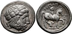 KELTISCHE MÜNZEN OSTKELTEN. Imitationen griechischer Münzen. Tetradrachme (13,97 g), Philippos II.-Imitation, Typus "Unvollständige Legende und Verwilderung". Stilisierter Kopf des Zeus mit Lorbeerkra