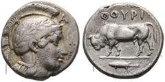 GRIECHISCHE MÜNZEN LUCANIA. Thurium. Triobol (1,20 g), ca. 443-400 v. Chr. Kopf der Athena mit attischem Helm und Lorbeerkranz, im oberen r. Feld A / Stier, am hinteren Oberschenkel A, im Abschnitt Fi