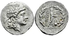 Greek Coins Aeolis. Myrina. Tetradrachm. 155-145 BC. (Sacks-20). (Sng Cop-223). Anv.: Laureate head of Apollo to right. Rev.: Apollo Grynios standing to right, holding phiale in right hand, filleted l