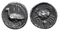 Greek Coins Sicily. Akragas. Litra. 471-430 BC. (Hgc-2, 121). Anv.: Eagle standing left on Ionic capital. Rev.: Crab. Ag. 0,67 g. Scarce. VF. Est...100,00. Spanish Description: Sicilia. Akragas. Litra