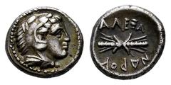 Greek Coins Kingdom of Macedon. Alexander III, "The Great". Obol. 320-317 BC. Amphipolis. (Sng Cop-696). (Price-157). Anv.: Head of Herakles right, wearing lion skin headdress. Rev.: Thunderbolt, AΛEΞ