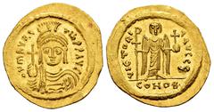 Byzantine Empire Mauricius Tiberius. Solidus. 583-601 AD. Constantinople. (MIBE-6). (Doc-5f). (Sear-478). Anv.: O N MAVRC TIЬ P P AVC, draped and cuirassed bust facing, wearing plumed helmet with pend