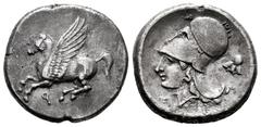 Greek Coins Corinthia. Corinth. Stater. 400-350 a.C. (Bcd-Corinth 115). (Calciati-402). (Ravel-1040). Anv.: Pegasus flying left, below Ϙ. Rev.: Head of Athena on the left, with Corinthian helmet, in f