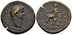 Roman Imperial Nero. Sestertius. 65 d.C. Rome. (Ric-I 273). (Bmcre-173). Anv.: NERO CLAVD CAESAR AVG GER P M TR P IMP P P, laureate head to right. Rev.: Roma, helmeted and draped, seated to left on cu