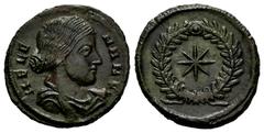 Roman Imperial Helena. Follis. 318-319 AD. Thessalonica. (Ric-VII 50). Anv.: HELENA N F, draped bust to right. Rev.: Laurel wreath enclosing star. Ae. 2,61 g. A good sample. Irregular patina. XF. Est.