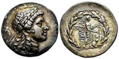 Greek Coins Aeolis. Myrina. Tetradrachm. 155-145 BC. Stephanophoric type. (Sacks-29). (Sng von Aulock-1665). (Bmc-7). Anv.: Laureate head of Apollo right. Rev.: Apollo Grynios standing right, holding 