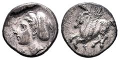 Greek Coins Corintia. Dracma. 308-306 a.C. (Gc-2643). Anv.: Pegaso a izquierda. Rev.: Cabeza de Peirene a izquierda. Ag. 2,61 g. MBC. Est...65,00. English: Corinthia. Dracma. 308-306 a.C. (Gc-2643). A