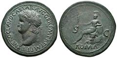 Roman Imperial / Imperio Romano Nerón. Sestercio. 65 d.C. Roma. (Ric-273). (Bmc-232). Anv.: NERO CLAVD CAESAR AVG GER P M TR P IMP P P. Cabeza laureada a izquierda. Rev.: ROMA SC. Roma sentada a izqui