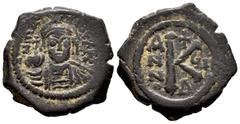 Byzantine Empire Mauricius Tiberius. 1/2 follis. 582-602 AD. Constantinople. (Bc-497). Ae. 7,10 g. VF. Est...25,00. SPANISH DESCRIPTION: Mauricio Tiberio. 1/2 follis. 582-602 d.C. Constantinopla. (Bc-