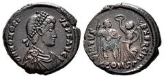 Roman Imperial Honorius. Nummus. 395-4011 AD. Constantinople. (Ric-61 (Arcadio)). Rev.: VIRTVS EXERCITI, emperor standing facing, head right, holding spear and shield, being crowned by Victory. Ae. 3,