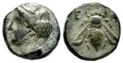 Greek Coins Ionia. Ephesos. AE 10. 375 BC. (SNG Kayhan-193). (Sng Cop-256). (Bmc-68/70). Anv.: Female head (Kabyle or Tyche) to left, wearing stephanos. Rev.: Bee; E-Φ across fields. Ae. 1,29 g. Almos