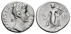 Roman Imperatorial Augustus. Denarius. 11-10 BC. Lugdunum. (Rsc-165). (Ffc-127). (Ric-180). (Cal-846). Anv.: AVGVSTVS DIVI. F . bare head of Augustus right. Rev.: IMP. - XII divided by Apollo standing