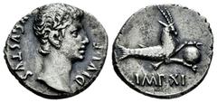 Roman Imperatorial Augustus. Denarius. 15-13 BC. Lugdunum. (Ffc-118). (Ric-174). (Cal-837). Anv.: AVGVSTVS DIVI. F bare head of Augustus right. Rev.: IMP. XI below capricorn right holding globe. Ag. 3