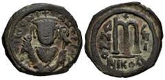 Byzantine Empire Tiberius II Constantine. 40 Nummi. Año 7 = 581/2 d.C. Nicomedia. (Doc-31b). (Mib-35). (SB-441). Anv.: D M TIb CONITANT PP AVC. Crowned bust facing, wearing consular robes and holding 