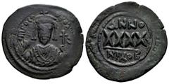Byzantine Empire Phocas. 40 Nummi. Year 5 = 606-7 AD. Nicomedia. (Doc-57b). (Mib-69b). (Sear-659). Anv.: D M FOCA PЄR AVς, bust facing, wearing crown with pendilia and consular robes, holding mappa an