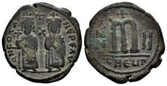 Byzantine Empire Phocas. 40 Nummi. RY 2 = 603/4 AD. Theoupolis (Antioch). (Doc-84). (Mib-83a). (Sear-671). Anv.: ∂ N FOCA NЄ PЄ AV, Phocas and Leontia standing facing, holding globus cruciger and cruc