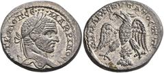 Roman Provincial SYRIA, Seleucis and Pieria. Emesa. Macrinus, 217-218. Tetradrachm (Billon, 26 mm, 13.51 g, 7 h). AVT K M OΠ CЄ••••MAKPINOC CЄB Laureate head of Macrinus to right. Rev. ΔHMAPX ЄΞ YΠATO
