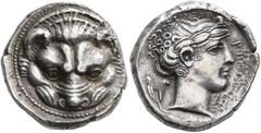 Greek BRUTTIUM. Rhegion. Circa 415/0-387 BC. Tetradrachm (Silver, 25 mm, 16.66 g, 6 h), reverse die signed by Kratesippos. Facing head of a lion. Rev. ΡHΓINOΣ Laureate head of Apollo to right; behind,