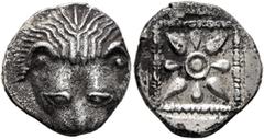 Greek CIMMERIAN BOSPOROS. Pantikapaion. Circa 460-450 BC. Triobol (Silver, 14 mm, 2.20 g). Facing head of a lion. Rev. Star of four rays and four petals with pellet-in-annulet center; all within pelle